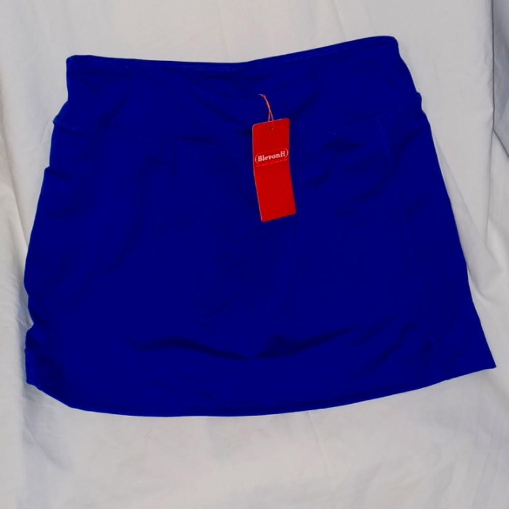 BlevonH women's Skort, blue in color, size M